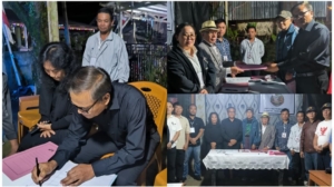 John F. Koampa saat mendaftar calon Hukum Tua Desa Tombasian Atas.